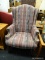 (R1) WINGBACK ARMCHAIR; PINK AND PASTEL UPHOLSTERED WINGBACK ARM CHAIR WITH BRONZE UPHOLSTERY WITH