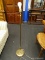 (R1) FLOOR LAMP; BRASS FLOOR LAMP WITH REEDED DETAILING. MEASURES 53 IN TALL. NEEDS SHADE.