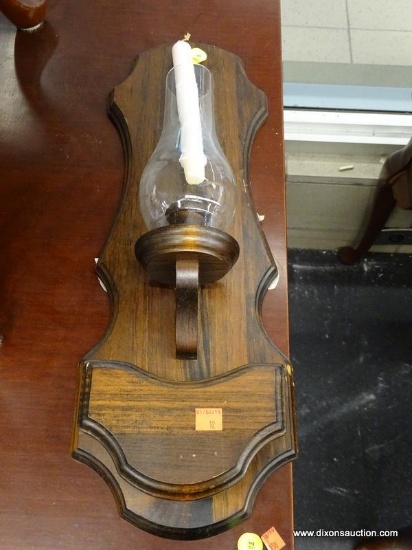 (WINDOW) WOODEN SCONCE; COMES WITH GLASS CHIMNEY AND CANDLESTICK. MEASURES 21 IN X 8 IN