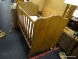 (R3) ANTIQUE CRIB; ANTIQUE WOODEN CRIB WITH SPRING BASE AND MATTRESS, HAS ADJUSTABLE WALLS AND