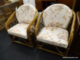 (R3) PAIR OF RATTAN PATIO CHAIRS; TWO RATTAN PATIO CHAIRS, HAVE SEAT AND BACK CUSHION WITH PASTEL