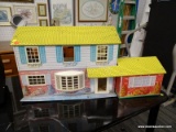 (R3) VINTAGE WOLVERINE TOYS DOLL HOUSE; 1950S DOLL HOUSE WITH DETACHABLE GARAGE. MODEL NO. 825.