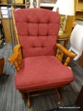 (R4) GLIDER CHAIR; MULE EAR, BANNISTER BACK GLIDER CHAIR WITH A BURGUNDY, BUTTON TUFTED CUSHION.