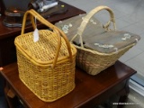 (WINDOW) PAIR OF PICNIC BASKETS; TWO WICKER PICNIC BASKETS, ONE WITH A LID AND 2 HANDLES. COMES WITH