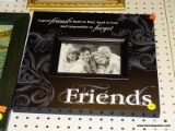 (WALL) HANGING FRIENDS FRAME; BLACK FRAME WITH SCROLLING ACCENTS AND 