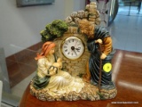 (WINDOW) QUARTZ BATTERY POWERED CLOCK; CLOCK SHOWING A SCENE OF A MARY MAGDALENE FIGURE HOLDING BABY