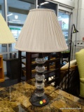 (R1) TABLE LAMP; METAL AND GLASS TABLE LAMP WITH TURNED STEM, HAS FIVE GLASS CROWN ACCENTS ALONG