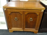 (R2) SEWING CABINET; WOODEN, LIFT TOP SEWING TABLE WITH 2 LOWER CABINET DOORS THAT OPENS TO REVEAL