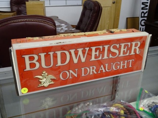 (R1) BUDWEISER LIGHT UP WALL SIGN; RED BAR SIGN READS" BUDWEISER ON DRAUGHT", HAS BRACKETS IN THE