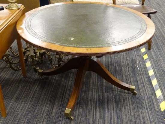 (R1) ROUND LEATHER TOP TABLE; WOODEN TABLE WITH INLAID LEATHER SURFACE, LEATHER HAS SCROLL AND LEAF