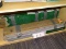 (R9) LOT OF MSI VINYL FLOORING PANELS; FOUR 16-PIECE PACKAGES OF DEVON OAK 6 IN X 36 IN RIGID CORE