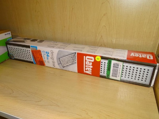 (R6) OATEY DESIGNLINE 24" LINEAR DRAIN WITH A SQUARE PATTERN. COMES IN OPENED BOX.