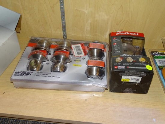 (R6) 2 PIECE LOT TO INCLUDE A KWIKSET DEADBOLT WITH A KEY ON ONE SIDE AND A DEFIANT BRANDYWINE