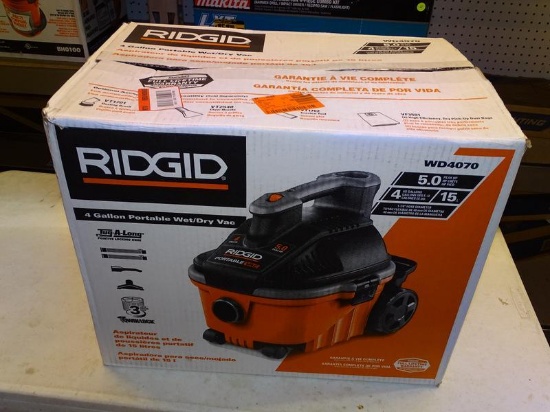 (WALL) RIDGID SHOP VACUUM; 4 GAL. 5.0-PEAK HP PORTABLE WET/DRY SHOP VACUUM WITH FINE DUST FILTER,