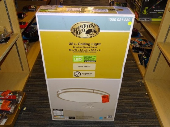 (R9) HAMPTON BAY OVERHEAD LIGHT; BRUSHED NICKEL LED OVAL FLUSH MOUNT. HAS 18 IN DIAMETER. ITEM CODE