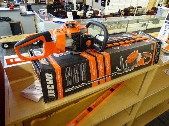 (R2) ECHO HEDGE TRIMMER; 20 IN. 21.2 CC GAS 2-STROKE CYCLE HEDGE TRIMMER. ITEM CODE HC-2020. COMES