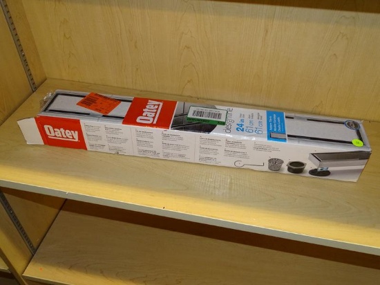 (R2) OATEY LINEAR DRAIN; DESIGNLINE STAINLESS STEEL LINEAR DRAIN, 24 IN LONG WITH A TILE-IN GRATE.