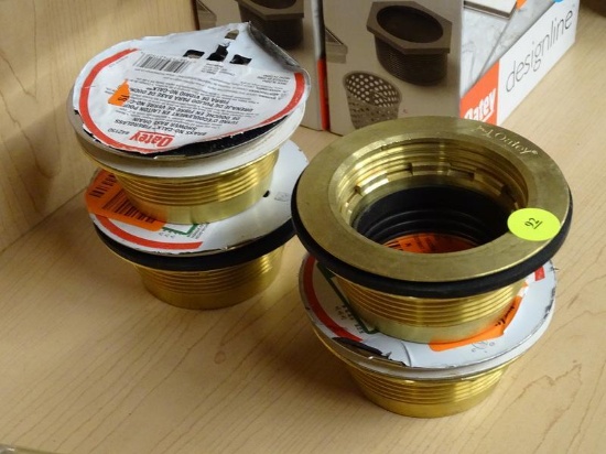 (R4) LOT OF OATEY SHOWER BASE DRAINS; 4 PIECE LOT OF BRASS, NO-CALK, FIBERGLASS, ROUND SHOWER BASE