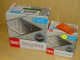 (R8) OATEY SQUARE DRAINS; DESIGNLINE 6 IN. X 6 IN. DRAIN AND 4 IN X 4 IN DRAIN, HAVE SQUARE GRATES.