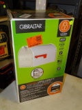 (R8) GIBRALTAR, LOCKING, LARGE CAPACITY, MARSHALL STYLE, POST MOUNT MAILBOX WITH A WHITE COLOR.