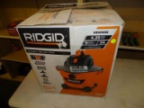 (R4) RIDGID 9 GALLON WET/DRY VAC WITH 4.25 HP. MODEL NO. HD0900. COMES IN DAMAGED BOX.