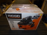 (R6) RIGID 4 GALLON PORTABLE WET/DRY VAC WITH 5HP. MODEL NO. WD4070. COMES IN OPENED BOX.