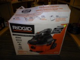 (R6) RIGID 4 GALLON PORTABLE WET/DRY VAC WITH 5HP. MODEL NO. WD4070. COMES IN OPENED BOX.