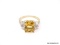 LADIES GOLD AND CITRINE RING; 14K YELLOW GOLD RING WITH A PRINCESS CUT YELLOW CITRINE CENTER STONE,