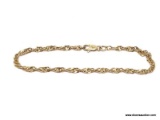 GOLD OVER .925 LADIES BRACELET; ROPE STYLE 14K OVER .925 STERLING SILVER LADIES BRACELET. 7 1/2 IN