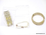 LOT OF LADIES BRACELETS; 3 PIECE LOT TO INCLUDE: A CORO 1.25 IN X 7 IN THICK GOLD TONE BRACELET, A