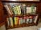 (DEN) SHELF LOT OF ASSORTED BOOKS; LOT TO INCLUDE THE BOTTOM 3 SHELVES OF THE BOOKCASE CONTAINING