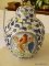 (LR) VINTAGE WBI ROOSTER GINGER JAR; HAND PAINTED PORCELAIN GINGER JAR WITH BLUE FLORAL ACCENTS.