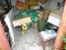 (FAR SHED) CONTENTS OF FAR SHED; LOT INCLUDES WHEEL BARROW, LAWN SPREADER, A FEW YARD TOOLS, DOOR, 4