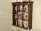 (DR) WALL HANGING TIERED DISPLAY SHELF; 3-TIERED, WOODEN DISPLAY SHELF WITH 4 TURNED BANNISTERS
