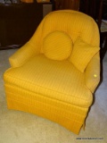 (DEN) ORANGE ARMCHAIR; AUTUMN COLORED UPHOLSTERED ARM CHAIR WITH A BUTTON TUFTED CUSHION BACK AND A