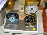 (BLUEBR) CLOCKS AND SCALE; 4 PIECE LOT TO INCLUDE A CHANTICLEER BLUE GLASS MIRROR CLOCK, AN EQUITY