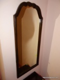 (PINKBR) WALL HANGING MIRROR; HANGING MIRROR WITH A ROUNDED TOP WALNUT FRAME. MEASURES 17.5