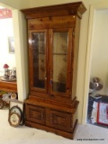 (LR) PINE GUN CABINET; 2 PIECE GUN CABINET WITH HUNTING SCENES ON THE INSIDE BACK WALL. TOP PIECE