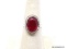 .925 GARNET RING; NEW DETAILED FACETED GARNET RING. SIZE 7. RETAIL PRICE $39.00.