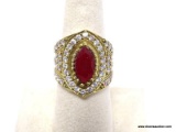 .925 & BRONZE GARNET RING; HANDMADE MOROCCAN RED RUBY GARNET WITH INLAID CZ RING. SIZE 7. RETAIL