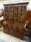 (R2) CHIPPENDALE STYLE CHINA CABINET; 2 PC CHINA CABINET WITH BRASS BATWING PULLS AND HANDLES, A