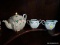 (R3) ASTROTED SADLER TEA ITEMS; ONE TURQUOISE COLORED TEAPOT WITH HAND PAINTED BRANCH DESIGNS, ONE