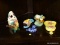 (R3) ASSORTED PORCELAIN ITEMS; ONE YELLOW BROOM THEMED WALL POCKET, ONE BLUE DUCK FLYING OUT OF POND