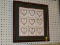 (WALL) FRAMED PRINT; DEPICTS A NINE SQUARED ROW OF 3 DESCRIBING WHAT LOVE IS AND DOES MADE BY CHARLE
