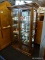 (R1) OAK CHINA CABINET; STAINED OAK, VINTAGE CHINA CABINET WITH 21 BEVELED GLASS PANES ON EACH DOOR