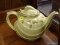 (R2) HALL PARADE TEA POT; 6 CUP, CANARY YELLOW TEAPOT WITH GOLD TONE OAK LEAF AND ACORN DETAILING.