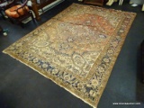 (R2) HAND WOVEN AREA RUG; BEIGE, BLUE, AND RED TONED, WOOL PILE AREA RUG WITH A FLORAL GEOMETRIC.