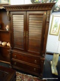 (R2) ENTERTAINMENT ARMOIRE; 2 PC. CHERRY ENTERTAINMENT ARMOIRE. TOP PIECE HAS A LEAF CARVED FLARED