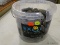 (R5) EXOTIC FIRE GLASS BLACK LAVA ROCKS; IN ORIGINAL CONTAINER WHICH IS BROKEN.
