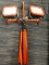 (R5) USED CRAFTSMAN WORK LIGHTS; RED AND BLACK DUAL CRAFTSMAN LED WORK LIGHTS ON TRIPOD FRAME.